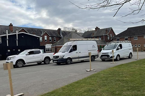 Our vans on site at a new roof installation.