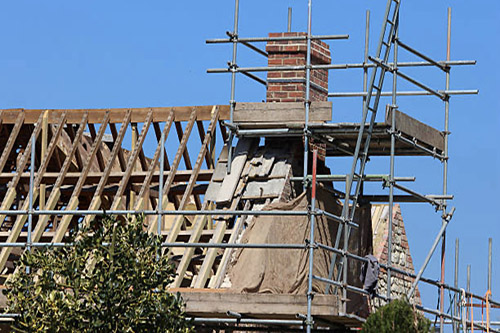 Scaffolding in use around a house